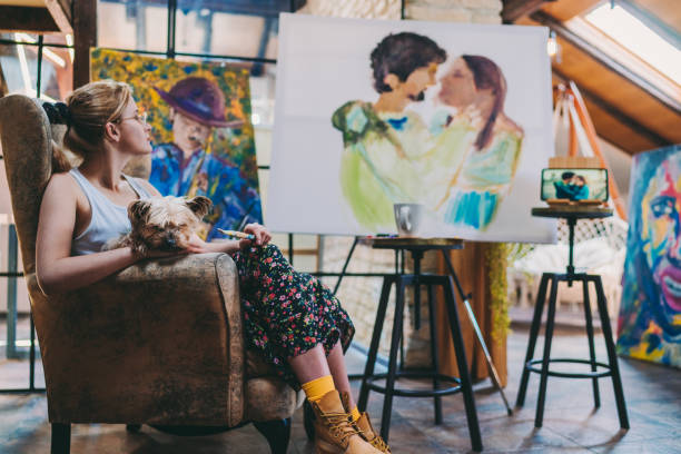 istock Painter artist in art studio repainting a photo 1273299302
