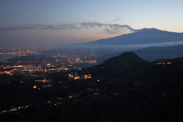 istock Castelmola - Etna smoke at vespers 1273300401
