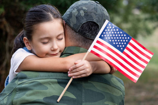 istock American Soldier And His Daughter 1273300568