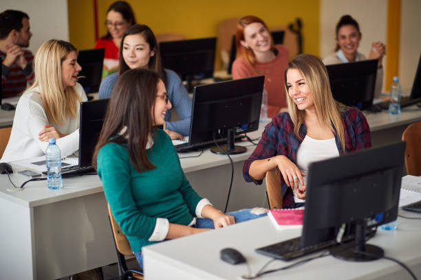 istock Young girls chatting in classroom 1273308589