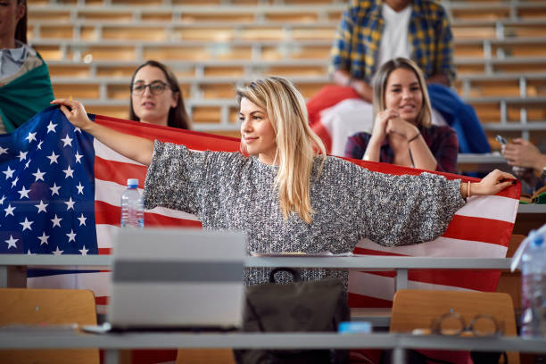 istock Female student with an American flag 1273311758