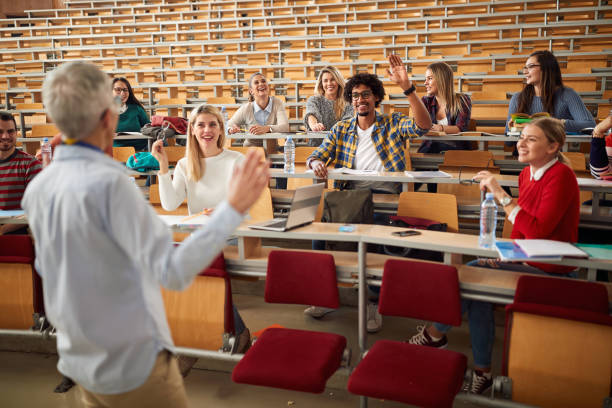 istock Amphitheater with group of students and teacher 1273315011