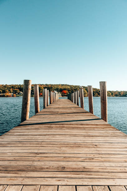istock pier in autumn in new england 1273319748