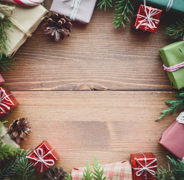 istock Christmas present on the wooden background 1273320376