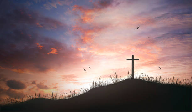 istock Religious concept: Silhouette cross and birds flying on  sunrise background 1273320548