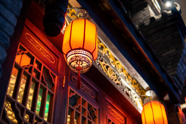 istock Red lanterns hanging in an ancient Asian town 1273320626