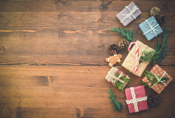 istock Christmas present on the wooden background 1273324576