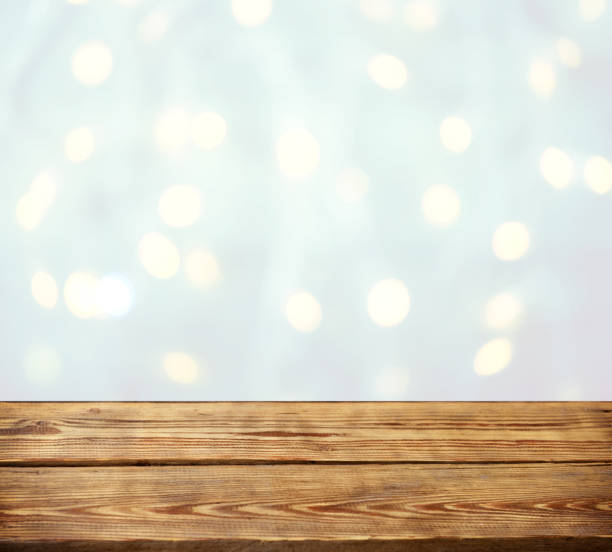 istock abstract background with bokeh light and wooden background 1273327217