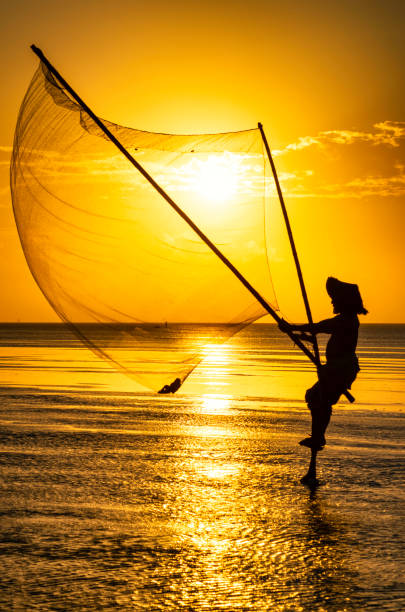 istock Shadow fishermen in the early morning. 1273327270