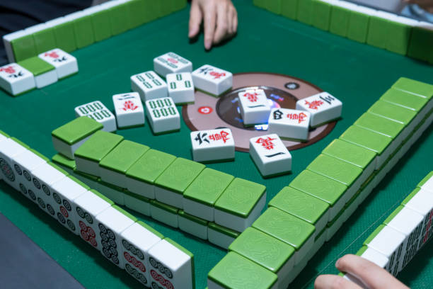 istock People playing the Chinese mahjong 1273330362