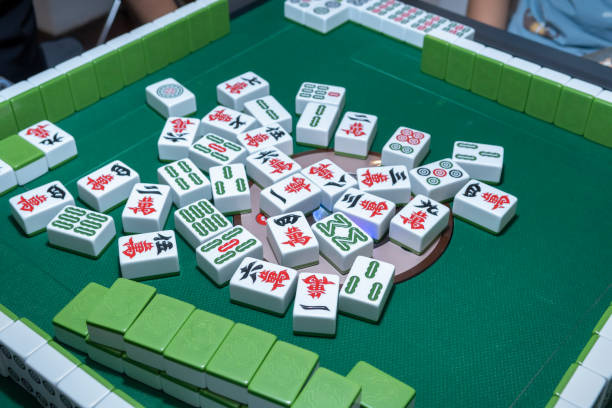 istock People playing the Chinese mahjong 1273330422