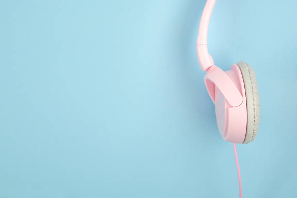 istock ASMR, Autonomous sensory meridian response, sensory meridian response concept with pink headphones on blur background 1273330491