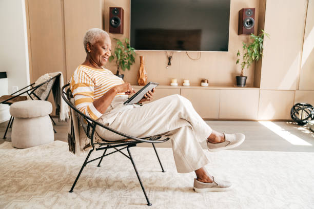 istock Online banking for senior women 1273330545
