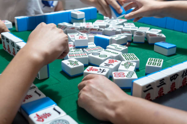 istock People playing the Chinese mahjong 1273331583
