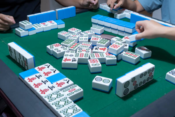 istock People playing the Chinese mahjong 1273331795