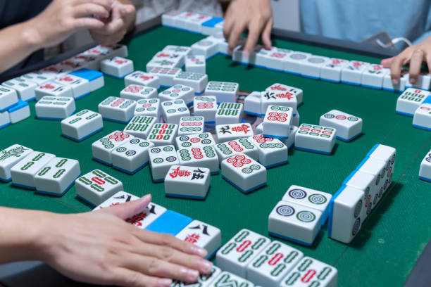 istock People playing the Chinese mahjong 1273331803
