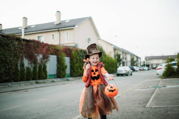 istock Child celebrating Halloween in autumn 1273334755