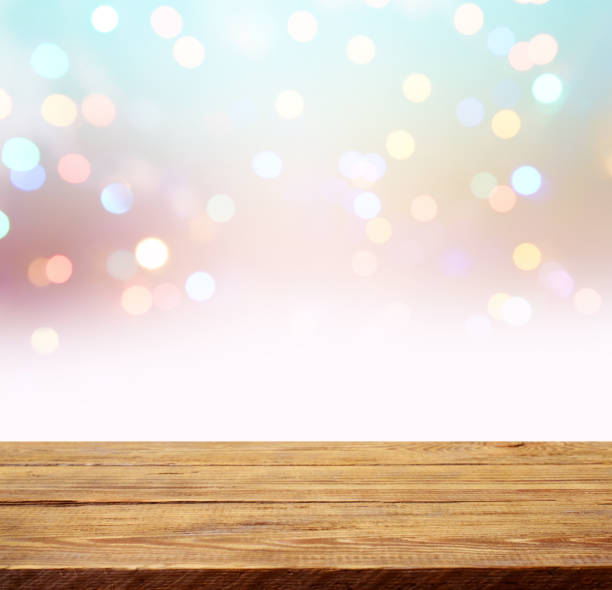istock abstract background with bokeh light and wooden background 1273336350