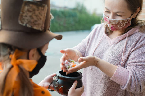 istock Child during COVID-19 pandemic on Halloween 1273336892