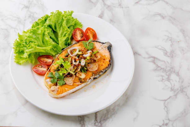 istock Spicy fried salmon salad 1273337967