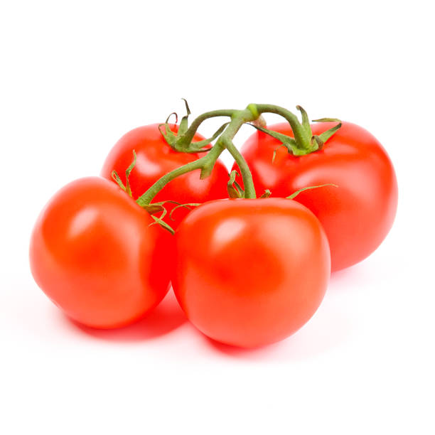 istock Tomatoes on a green branch on a white background. 1273339900