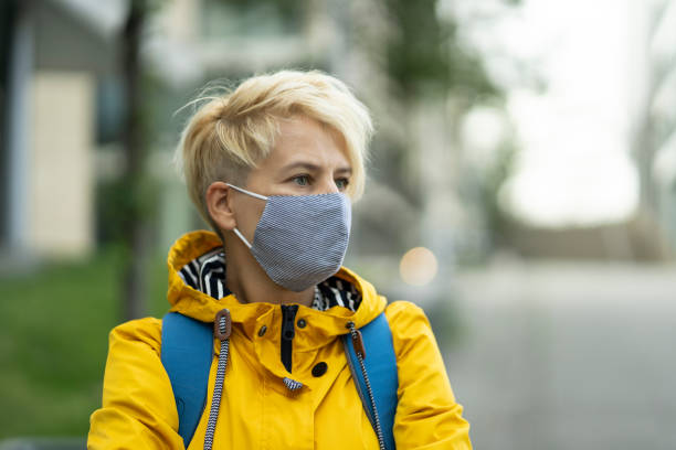 istock Woman with mask portrait 1273341051