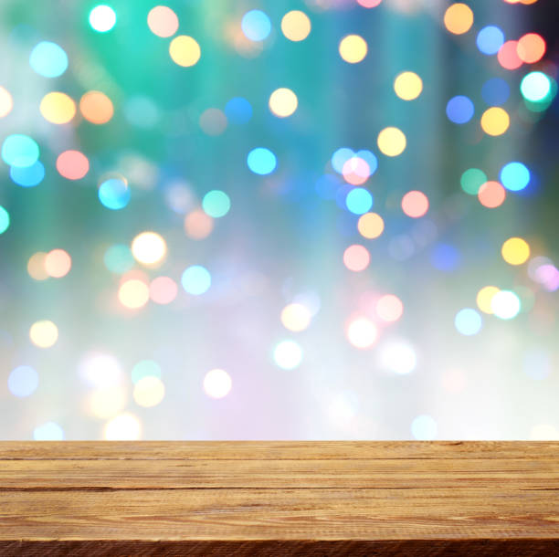 istock abstract background with bokeh light and wooden background 1273341071