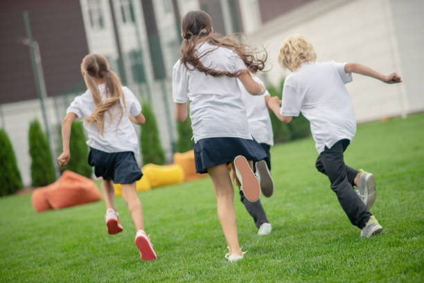 istock Group of teens having a running competition 1273342281