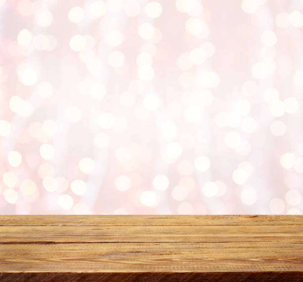 istock abstract background with bokeh light and wooden background 1273342335