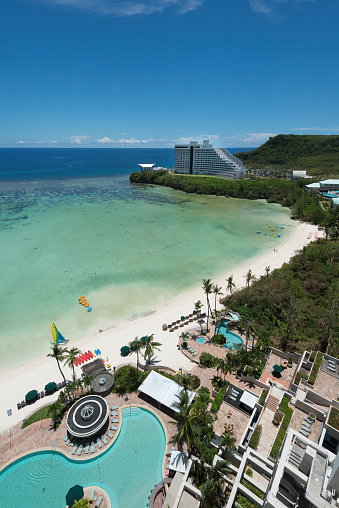 Tumon Bay, on the US island territory of Guam, draws tourists from all over. Guam is known for its beautiful beaches and clear ocean water. It also played an important role during World War 2.