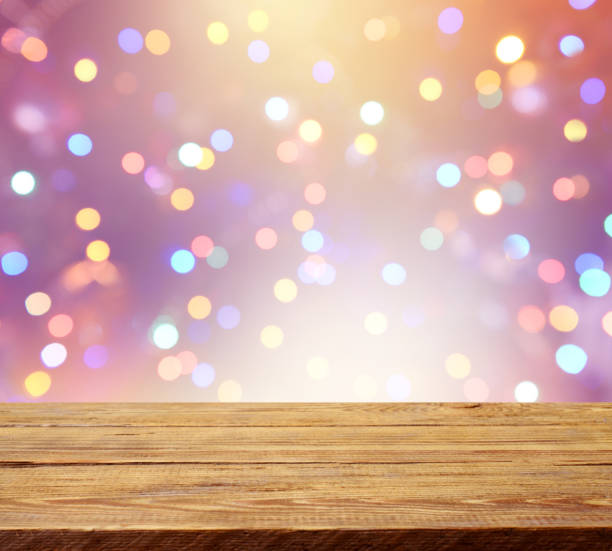 istock abstract background with bokeh light and wooden background 1273342675