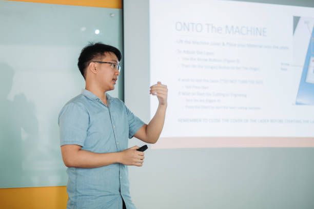 istock Asian chinese male student presenting in college classroom 1273343310
