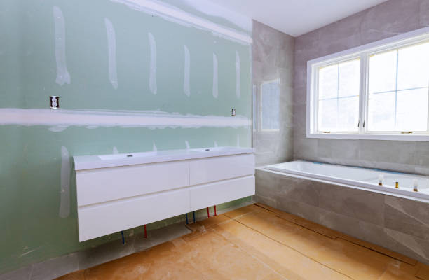 istock Construction details with industry renovation shower in tiled bathroom with molding windows 1273344810