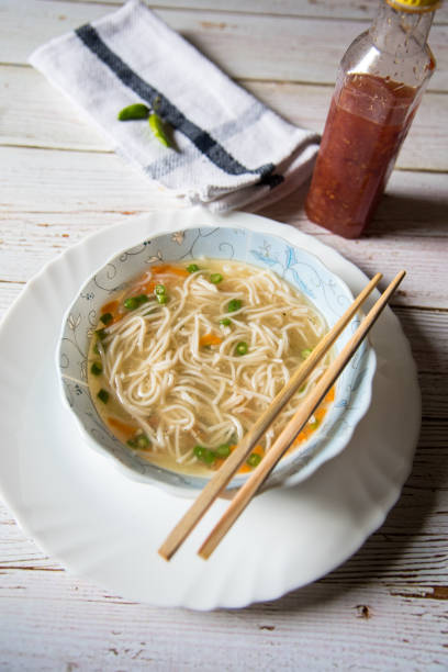 istock Vertical top view of Thai noodle soup with shrimp 1273345499