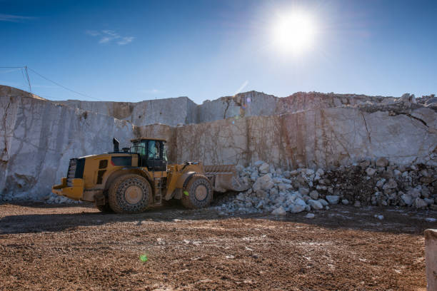 istock Bulldozer in a marble quarry 1273347459