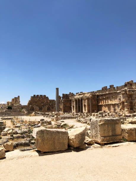 istock Old stone ruins with columns and rock piles on a bright sunny day. 1273350473