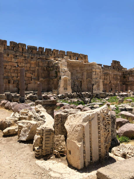 istock Old stone ruins with columns and rock piles on a bright sunny day. 1273350503