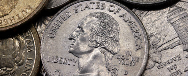 istock close-up one dollar coin detail on background 1273352392