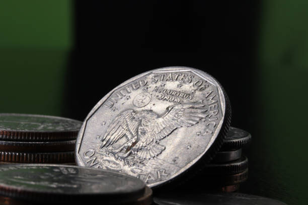 istock close-up one dollar coin detail on background 1273353385