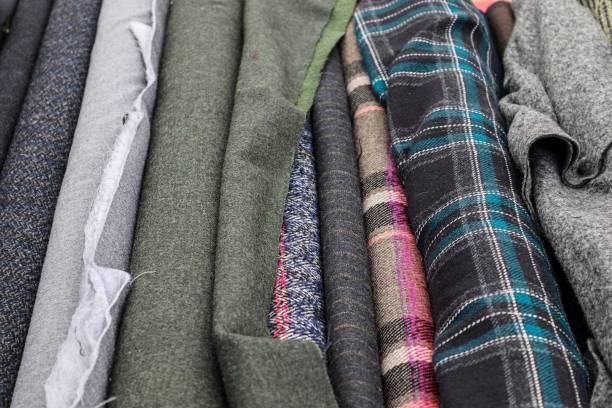 istock Detailed close up view on samples of cloth and fabrics in different colors found at a fabrics market 1273355729