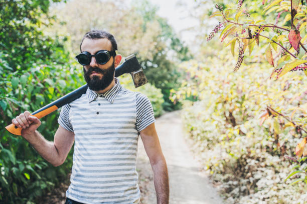 istock Chopping wood in in the forest 1273355866
