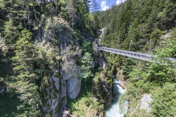 istock Impressive Leutasch gorge, sky walk suspended bridge river and waterfalls 1273356448