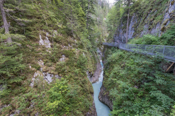istock Impressive Leutasch gorge, sky walk suspended bridge river and waterfalls 1273356511