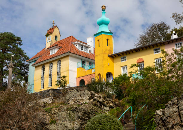 The Chantry and Onion Dome in Portmeirion, North Wales A view of the beautiful Chantry and Onion Dome in the village of Portmeirion in North Wales, UK. portmeirion stock pictures, royalty-free photos & images