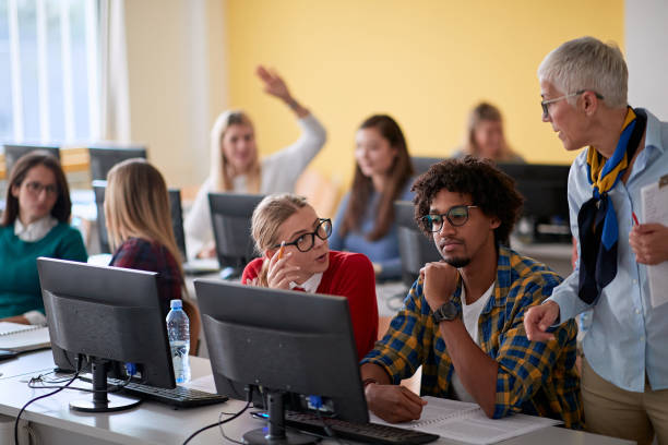 istock Female professor answering the student question at an informatics lecture 1273356864