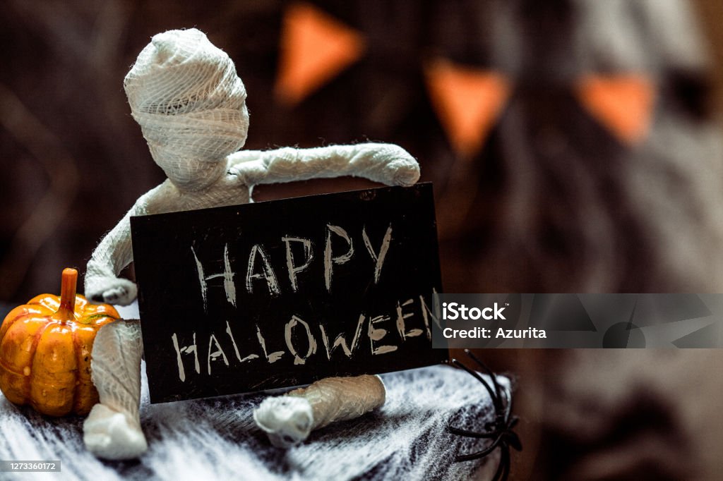 Cute funny mummy. Halloween decoration Cute funny mummy. Halloween decoration on a table Art Stock Photo