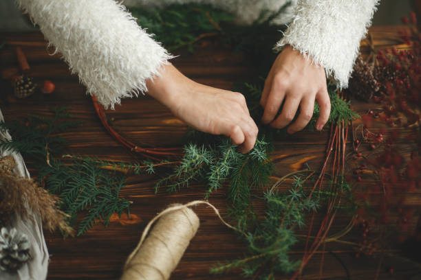istock Making rustic christmas wreath, holiday advent. 1273362798