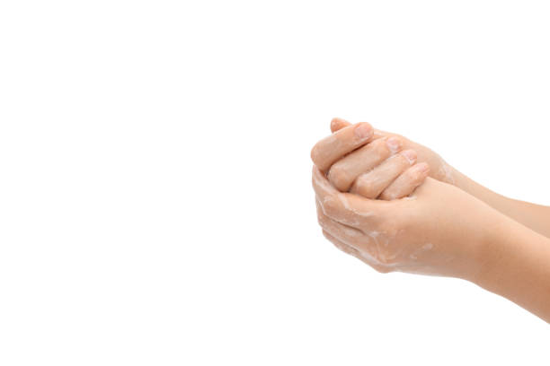 istock Lathering hands, process. Hands washing gesture, soapy female hand foam. Wash your hands concept. 1273370380