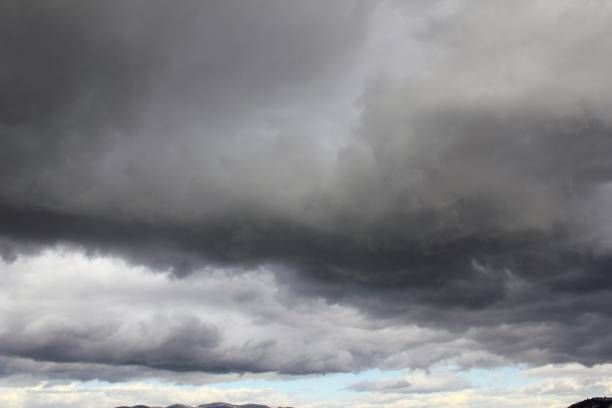 istock Stormy weather sky with dark clouds 1273370424
