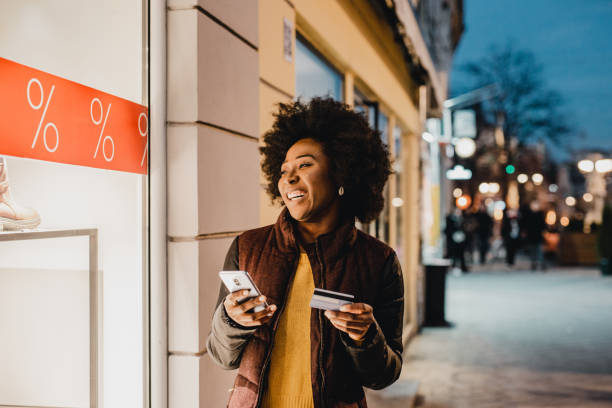 istock African American woman using mobile banking 1273370717